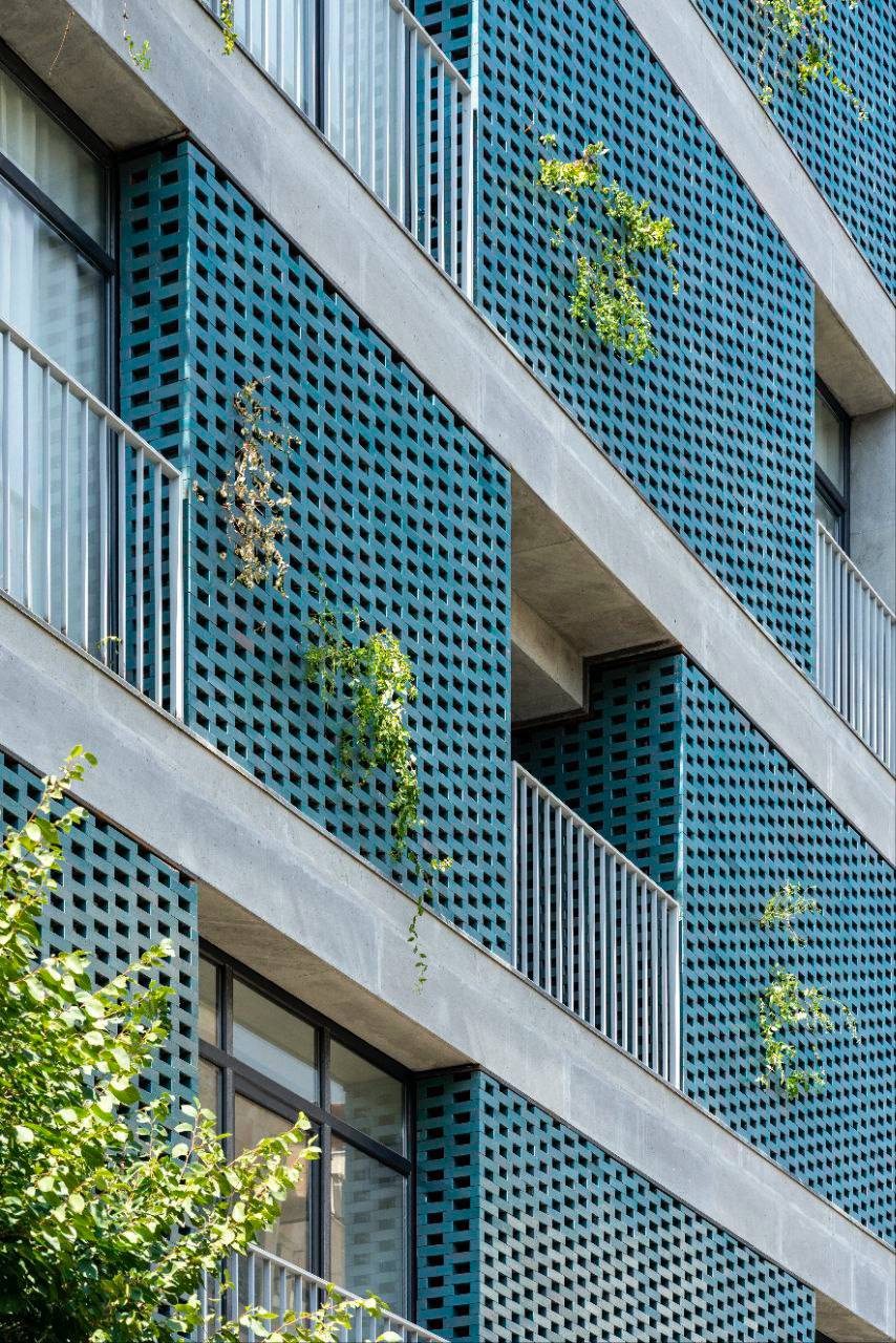 Building facade design with half Perforated bricks